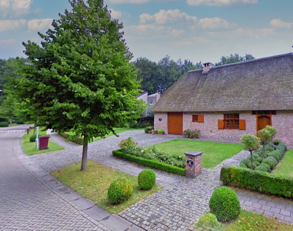 Groen in de voortuin gemeente Schoten grasmat aanleggen gras op rol kant en klaar in de omgeving